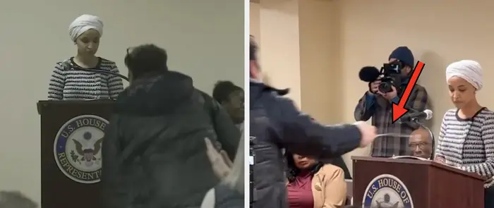 En person i stripete antrekk står ved et podium i US House og henvender seg til et publikum innendørs