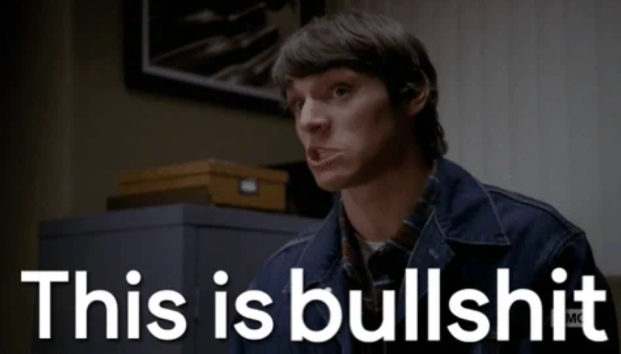 En person sitter og ser frustrert ut på et kontor. Tekstoverlegg lyder: 