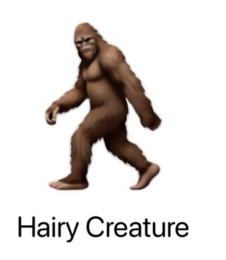 Illustrasjon av en hårete skapning som går oppreist med tekst under som leser