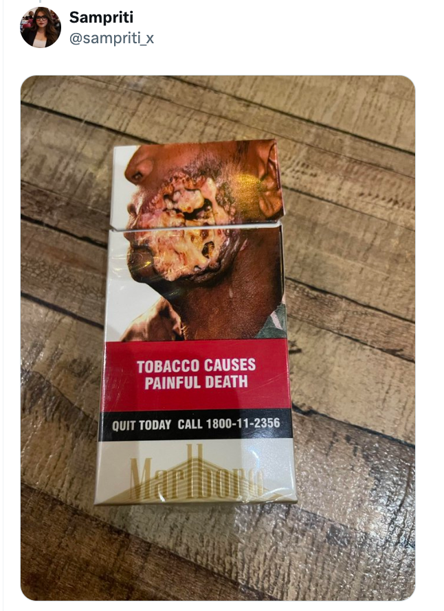 Sigarettpakke med grafisk helseadvarsel: et bilde av alvorlig ansiktsskade forårsaket av tobakk, advarsel om smertefull død inkludert