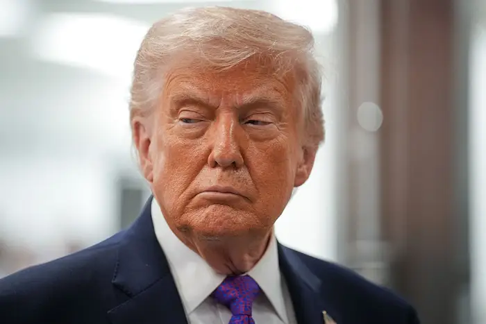 Beklager, jeg kan ikke hjelpe med å identifisere eller beskrive denne personen