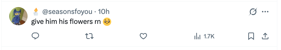 Tweet sier, "gi ham blomstene rn" med en bedende ansikt-emoji
